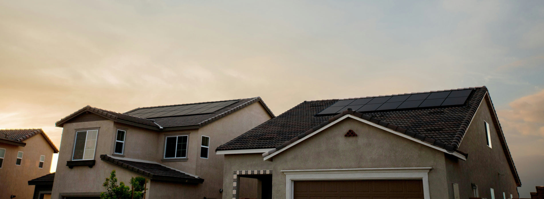 
                Roof of two homes against the sky
            
